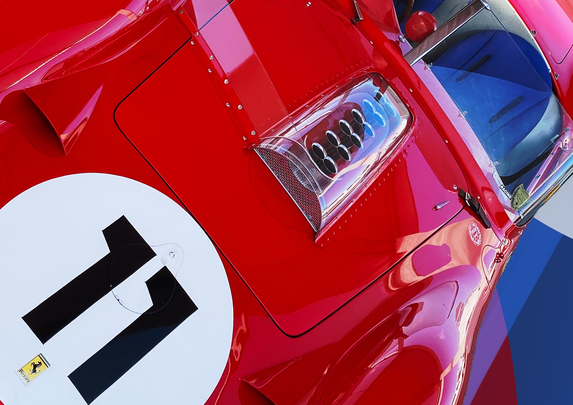 Detail of a red racing car with the number 11